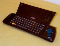 The remote, open, with 30cm rule